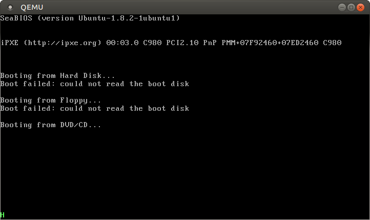 QEMU output with a green H in the lower left corner